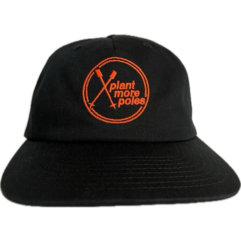 Black bucket hat with orange logo